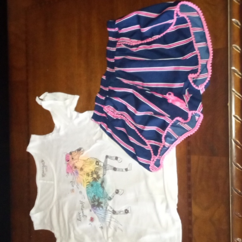 girl large cold shoulder top with blue pink shorts